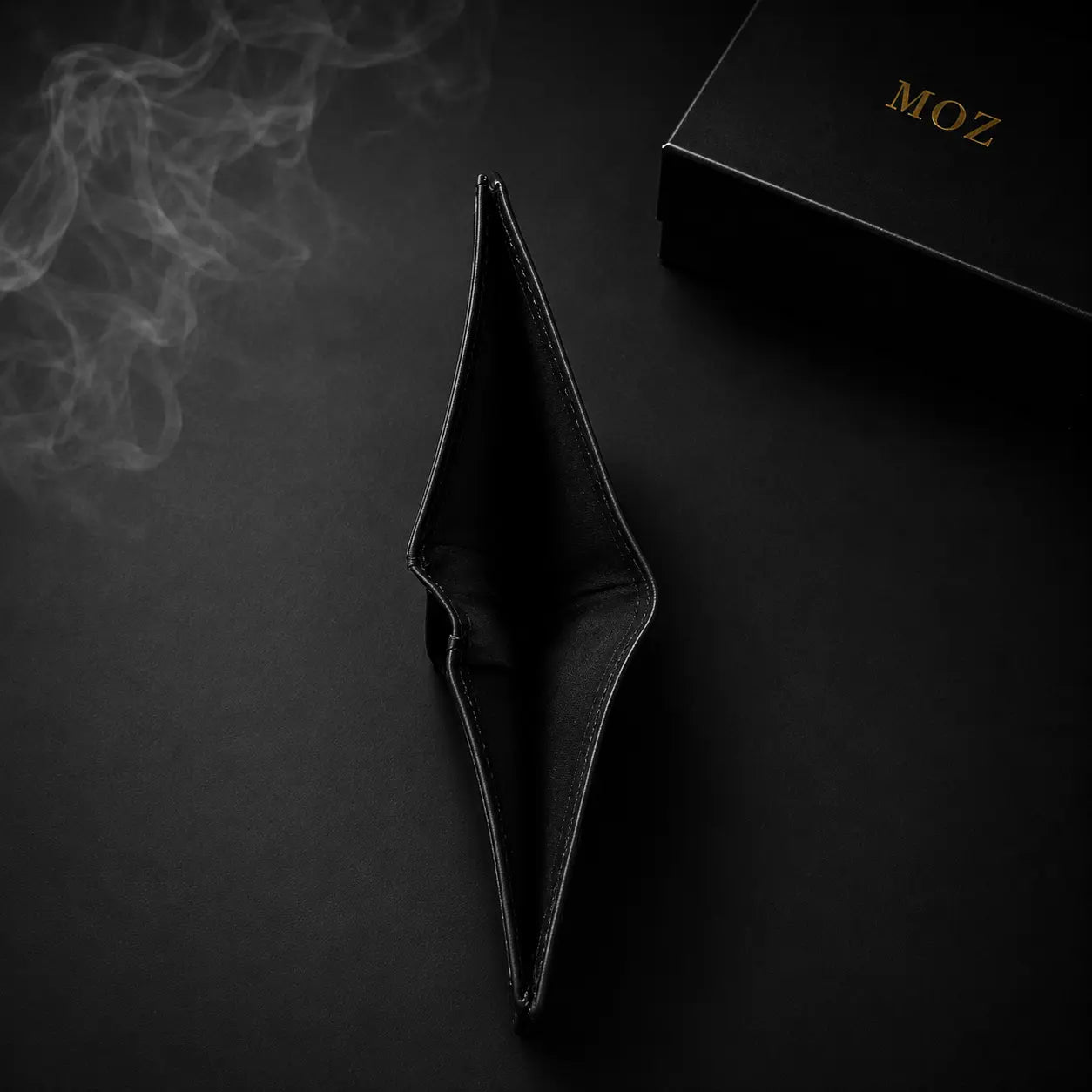 Black bifold wallet edge view showing interior compartment