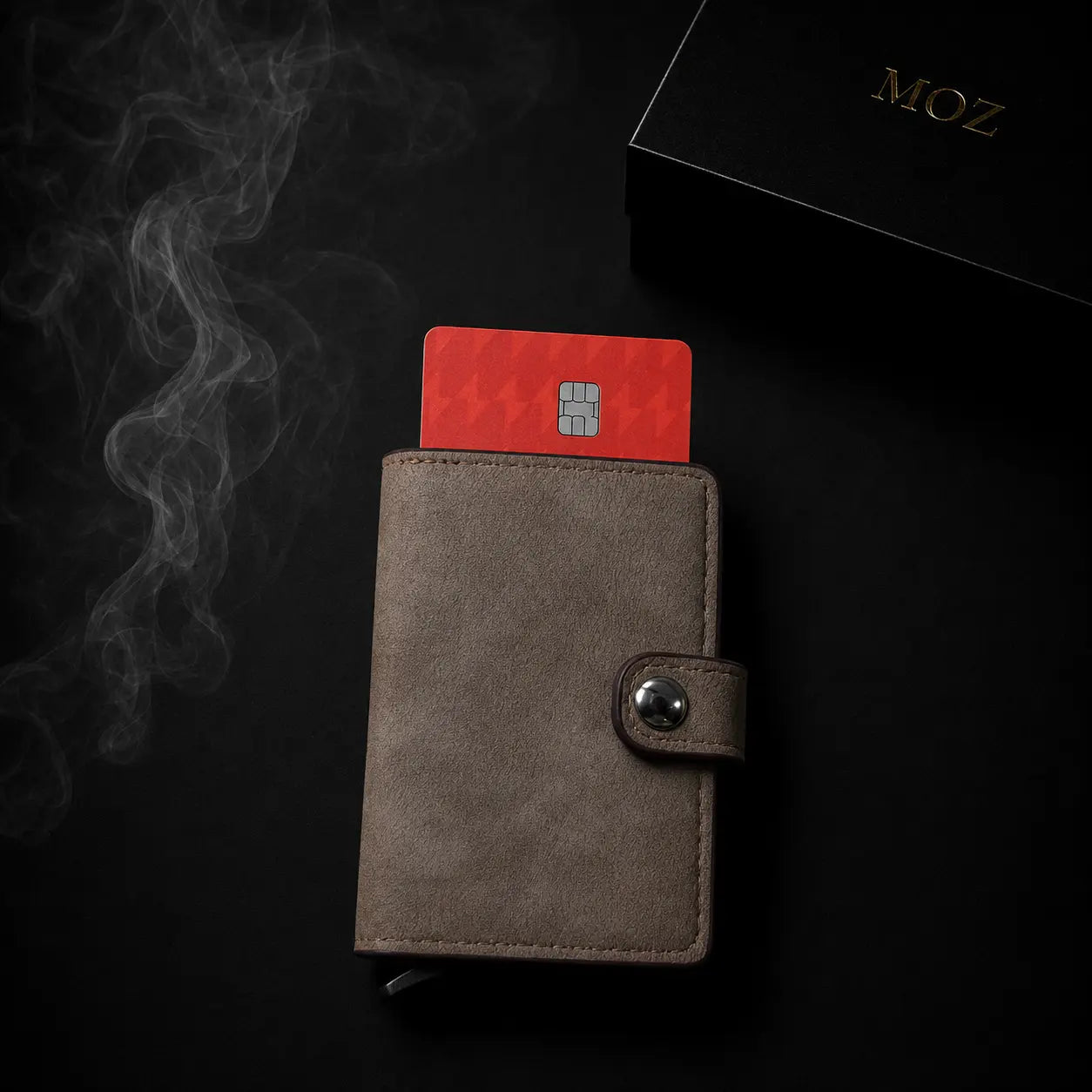 Taupe card holder wallet ejecting a card via pop-up mechanism