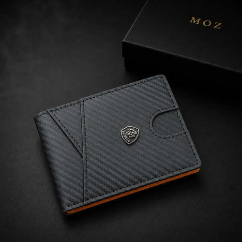 Black carbon-fiber textured bifold wallet with metal shield emblem and MOZ gift box