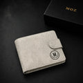 Stone grey suede-finish bifold wallet with embossed logo and MOZ gift box